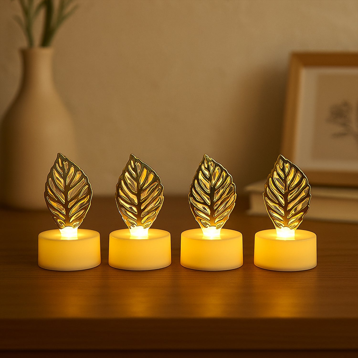 Decorative Golden Leaf Shaped Flameless LED Candles (4 Pc) Decorative Golden Leaf Shaped Flameless LED Candles (4 Pc)